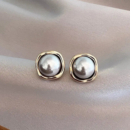 Boucles d'oreilles élégantes en perle noire | Or