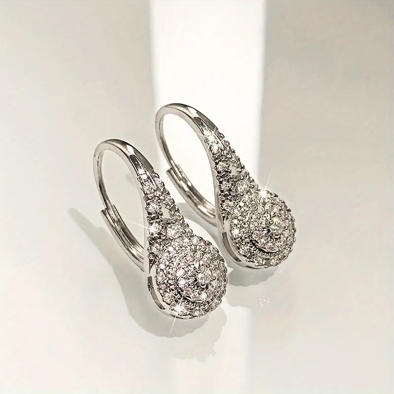 Boucles d'oreilles rondes avec goutte brillante | Or