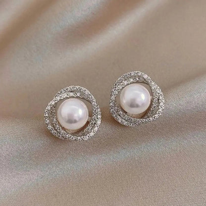 Boucles d'oreilles spirales brillantes avec des perles élégantes | Or