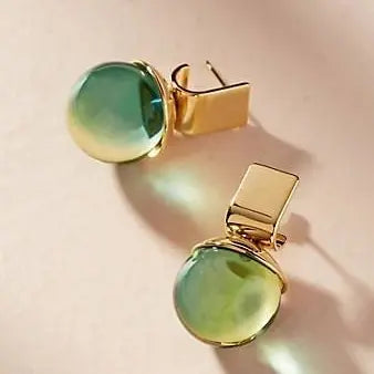 Boucles d'oreilles vintage avec cristal vert | Or
