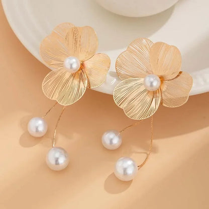 Boucles d'oreilles vintage avec fleurs et perles | Or