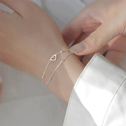Bracelet ajustable avec cœur | Or blanc