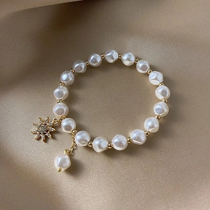 Bracelet avec médaillon, marguerite et tournesol | Or blanc