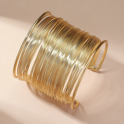 Bracelet ouvert avec spirale | Or