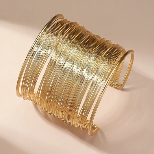Bracelet ouvert avec spirale | Or